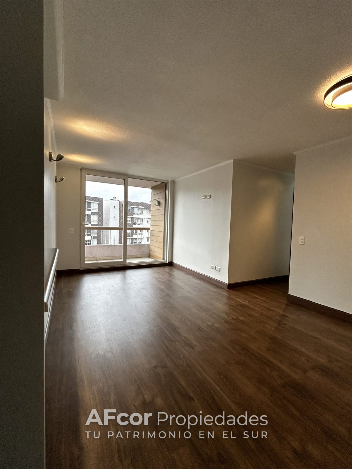 Living-comedor del departamento en Osorno